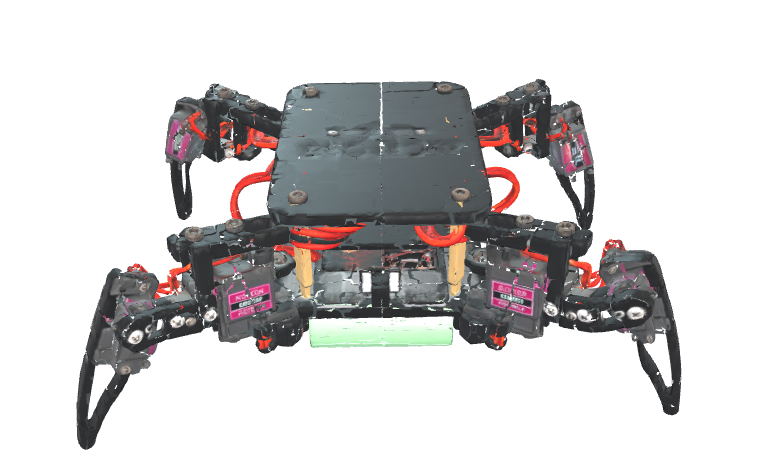 Ankaboot, a black four-legged robot spider with red cables and a green battery pack